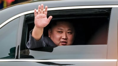 Kim Jong-un waves from his car after arriving by train at Dong Dang railway station near the border with China on February 26, 2019 in Lang Son, Vietnam. Getty Images