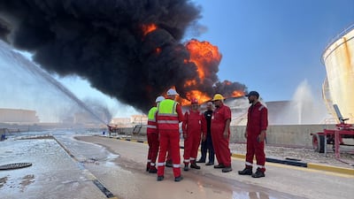 Flames and thick smoke rise from a burning fuel storage tank after a drone attack at Zawiya oil refinery in western Libya. EPA