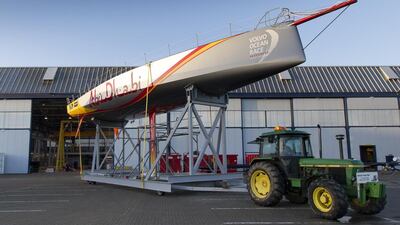 Abu Dhabi Ocean Racing's new Volvo Ocean 65 emerges from the Green Marine boat yard in Southampton, England, for the first time on February 26, 2014. Courtesy Ian Roman / Abu Dhabi Ocean Racing