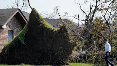 President Joe Biden tours a neighborhood impacted by Hurricane Ida, on September 3, 2021, in LaPlace, Louisiana. AP