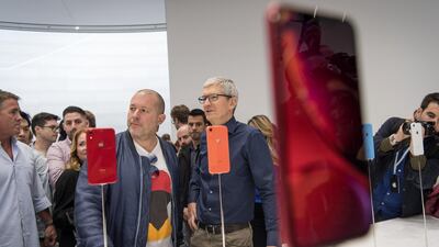 Tim Cook, chief executive officer of Apple Inc, right, and Jony Ive, chief design officer, speak during the launch event in California. David Paul Morris/Bloomberg