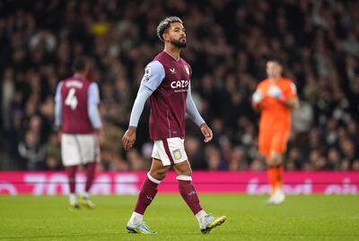 Aston Villa's Douglas Luiz is sent off by referee Michael Oliver. PA
