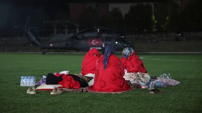 A football stadium in Sindirgi, Turkey, was used to put up some local residents overnight after a 6.1-magnitude earthquake killed one person and destroyed 16 buildings. AP