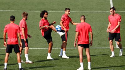 Real Madrid's Marcelo, Gareth Bale and teammates during training. Reuters