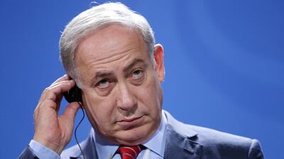 Israeli prime minister Benjamin Netanyahu speaks during a press conference with German Chancellor Angela Merkel following their meeting in Berlin. Michael Kappeler / EPA