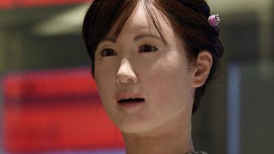 ChihiraAico welcomes customers at an information desk of Nihonbashi Mitsukoshi Main Store in Tokyo. FRANCK ROBICHON / EPA