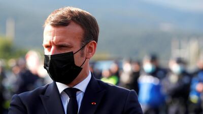 French President Emmanuel Macron speaks to police officers during a visit on the strengthening of border controls as he warned France had become a breeding ground for terrorists. REUTERS