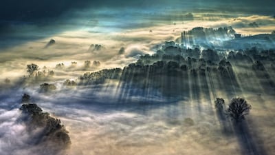 Giulio Montini had to be quick to capture this image on a foggy autumn day in the town of Airuno, Italy.