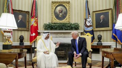 President Donald Trump speaks with Abu Dhabi's Crown Prince Sheikh Mohammed bin Zayed in the Oval Office of the White House in Washington