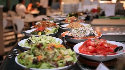 Corporate events, dinner buffets and brunches are a major source of food waste, campaigners said. Paulo Vecina / The National