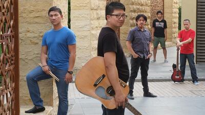 The Filipino rock band Sons of Asaph, from left, John Paul Abuda, Erick Lacson, Darwin Jose, Ferdie Flores and Omar Vallejo take pride in the variety of music they can play. Delores Johnson / The National