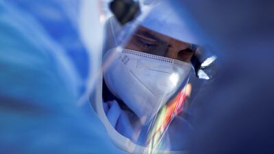 A surgeon uses the robotic arm known as "Mako" on a patient undergoing knee surgery, at the UPMC Salvator Mundi International Hospital in Rome, Italy. Reuters