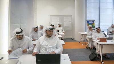 ABU DHABI, UNITED ARAB EMIRATES - September 20, 2017: Students attend a class during the inauguration of the Rabdan Academy. ( Mohamed Al Hammadi / Crown Prince Court - Abu Dhabi ) ---