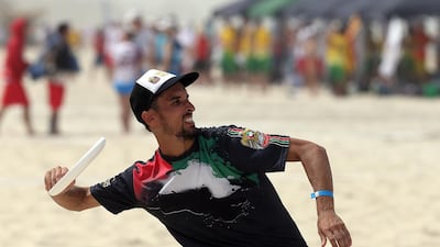 UAE player Alex Niswander in action against Qatar during the 2015 World Championships of Beach Ultimate (WCBU) at the JBR beach in Dubai. Satish Kumar / The National