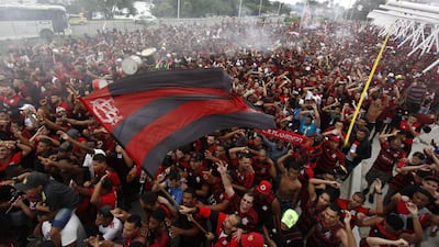 Fans of Brazilian football club Flamengo see their team off to the Rio de Janeiro-Galeao International Airport on Wednesday, November 20, with a party called the "Aerofla" ahead of the Copa Libertadores Final final against Argentine side River Plate. Getty