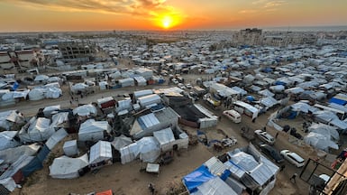 Thousands of displaced Palestinians have been forced to seek shelter in tents during harsh winter weather. Reuters