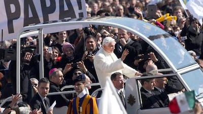 Pope Benedict XVI arrives in St Peter's Square for his final general audience on Wednesday. Franco Origlia / Getty Images