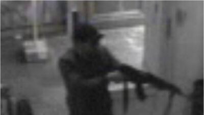 An image from CCTV security camera footage of the suspect in Saturday's Jewish Museum shooting in Brussels entering the building. Police Federale / EPA