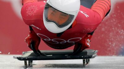 Wenqiang Geng of China starts his practice run during the men's skeleton training at the 2018 Winter Olympics in Pyeongchang. Wong Maye-E / AP Photo