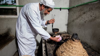 Al-Thani with a traditional distillation unit at his home.