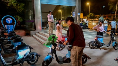 Electric scooters offered by sharing apps in New Delhi, India. The energy crisis has forced countries reliant on oil imports from the Middle East to promote alternative means of transport. Getty Images