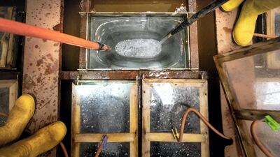 Crystal-clear ice blocks weighing 200 kilograms take a week to produce. This is accomplished by keeping the water in motion while it is slowly frozen. This causes the ice to form without trapping air inside, giving it a clear, see-through finish that is perfect for ice sculptures. Such sculptures can last anywhere from 6 to 12 days before melting away. Antonie Robertson / The National