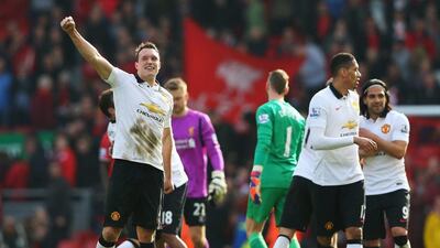 Phil Jones of Manchester United celebrates victory after their Premier League win against Liverpool on Sunday. Alex Livesey / Getty Images / March 22, 2015
