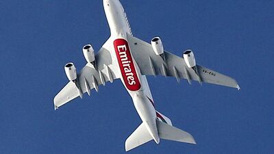 An A380 Emirates Airlines plane flies over Paris. Reuters