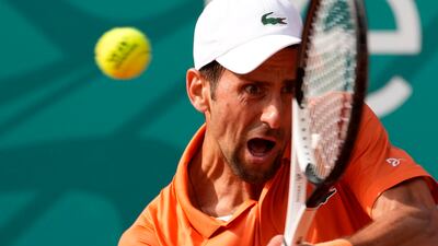 Djokovic returns to Andrey Rublev. AP