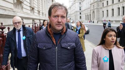 Richard Ratcliffe (C), the husband of Nazanin Zaghari-Ratcliffe, and MP Tulip Siddiq (R) before the meeting with Liz Truss. PA