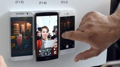 Media get to look at the new LG G4 phone. Timothy Clary / AFP