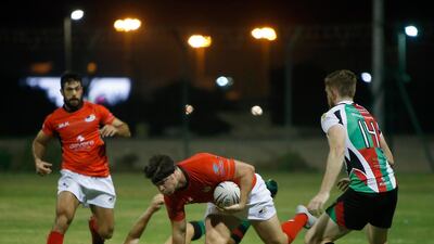 Abu Dhabi Saracens, in red, are back up again after stumbling in the recent past. Ravindranath K / The National
