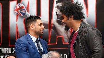 LONDON, ENGLAND - FEBRUARY 29: David Haye meets Amir Khan during a press conference to preview the fight between Amir Khan and Canelo Alvarez at the Park Plaza Riverbank Hotel on February 29, 2016 in London, England. (Photo by Julian Finney/Getty Images)