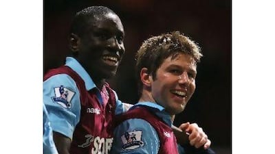 Demba Ba, left, and Thomas Hitzlsperger celebrate during West Ham's FA Cup win over Burnley. Paul Gilham / Getty Images