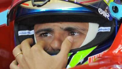 The Formula One driver Felipe Massa sits in his car during a practice session for Sunday's unsuccessful British Grand Prix at Silverstone.