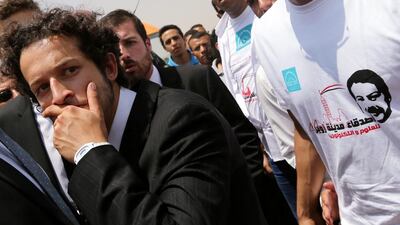 The sons of Ahmed Zewail attend his funeral service at their family's tomb in the October 6th suburb west of Cairo on August 7, 2016. Mohamed Abd El Ghany/Reuters