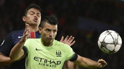 Manchester City’s Argentinian forward Sergio Aguero (R) vies with Paris Saint-Germain’s Brazilian defender Thiago Silva during the Uefa Champions League quarter final football match between Paris Saint-Germain (PSG) and Manchester City on April 6, 2016 at the Parc des Princes stadium in Paris. AFP PHOTO / MARTIN BUREAU