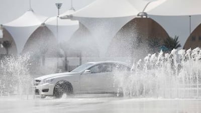 A Mercedes CL63 AMG on the skid pad at Yas Marina Circuit.