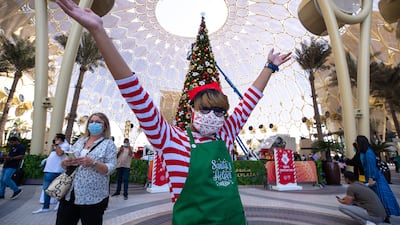 Expo 2020 Dubai's Christmas tree being put up by the elves. Victor Besa / The National