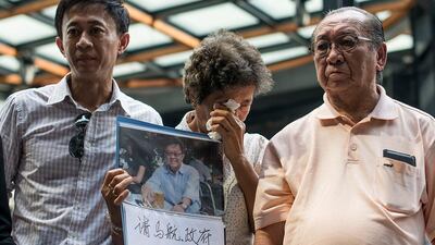 Later Sunday, the Malaysian government will release an interim investigation report, a requirement under international civil aviation regulations. Anthony Kwan / Getty Images