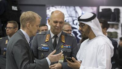 Sheikh Mohammed, right, with Lt Gen Arto Raty Deputy prime minister of Finland, centre, and a member of the Finnish delegation. Mohamed Al Hammadi / Crown Prince Court — Abu Dhabi