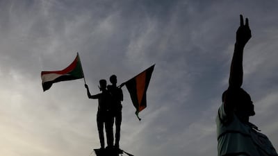 Sudanese demonstrators protest outside the Defence Ministry in Khartoum, Sudan April 14, 2019. REUTERS