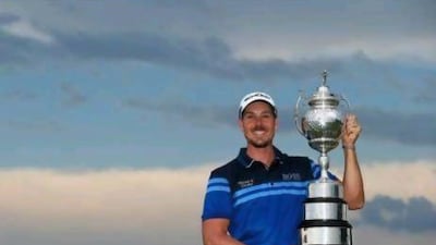 JOHANNESBURG, SOUTH AFRICA - NOVEMBER 18: Henrik Stenson of Sweden poses with the trophy after securing victory in the final round of the South African Open Championship at the Serengeti Golf Club on November 18, 2012 in Johannesburg, South Africa. (Photo by Richard Heathcote/Getty Images) *** Local Caption *** 156655069.jpg