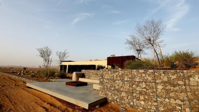 Al Faya Lodge consists of five bedrooms, a spa and a saltwater pool, with restaurants across the road. Satish Kumar / The National