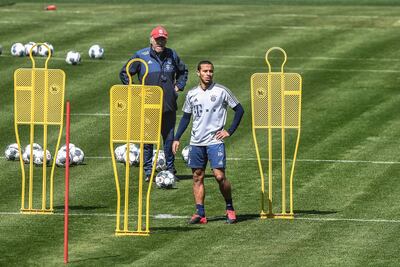 Bayern Munich's Thiago Alcantara (R) at the training session. AFP