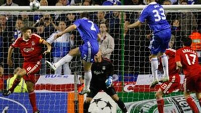Chelsea's Branislav Ivanovic, centre, heads to score against Liverpool at Anfield.