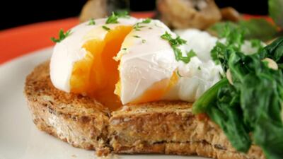 Eggs with spinach and mushrooms. Courtesy iStock
