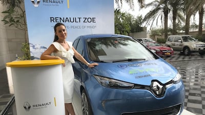 A Renault Zoe at the Hormuz Grand hotel in Muscat, one of the stop-offs on the road trip. Adam Workman / The National
