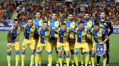 APOEL Nicosia's starting eleven pose before the match against Ajax. EPA