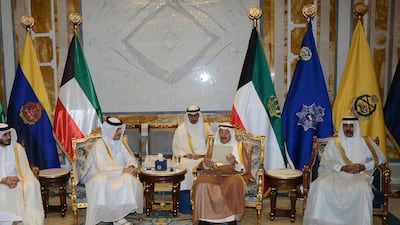 Mohammed bin Abdulrahman Al Thani, Qatar's foreign minister, hand over a letter from Qatar's emir rejecting demands put to them by the Arab quartet, to the Emir of Kuwait, Sheikh Sabah Al Ahmad Al Sabah, in Kuwait. EPA.